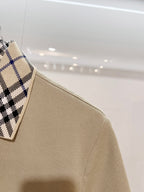Beige polo shirt sleeve and shoulder, textured weave