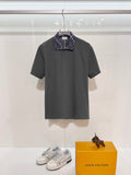 Mens short-sleeve polo shirt in dark gray with buttoned placket and plaid collar