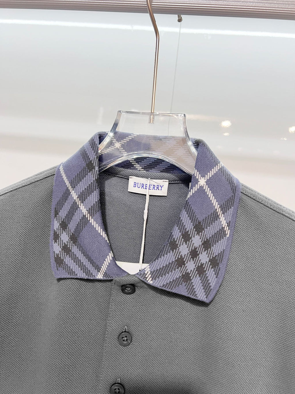 Mens polo shirt in dark gray with plaid collar and buttoned front