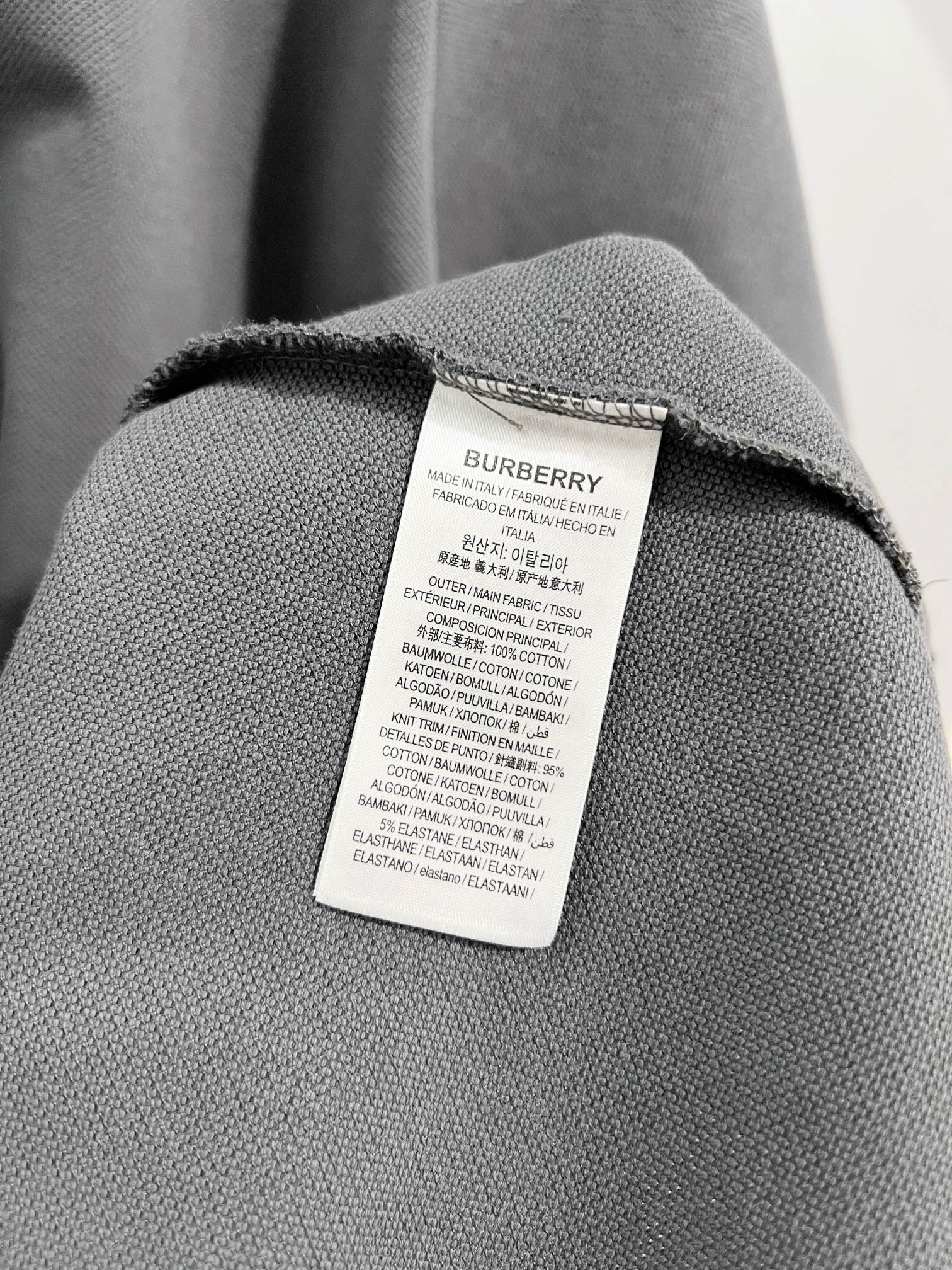 Mens polo shirt fabric with care label inside neck seam