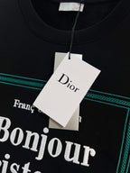 Black Dior T-shirt neckline with hanging Dior tag