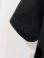 Black Dior T-shirt sleeve hem detail