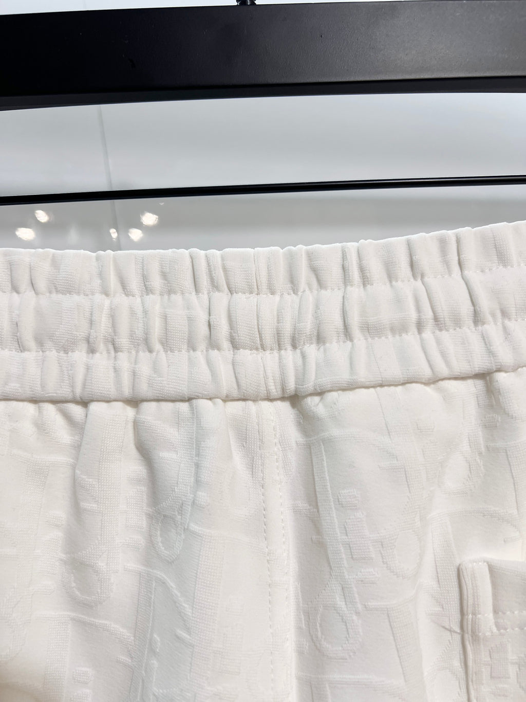 White shorts waistband with elastic gathers and drawstring channel
