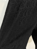 Black Dior monogram shorts side detail