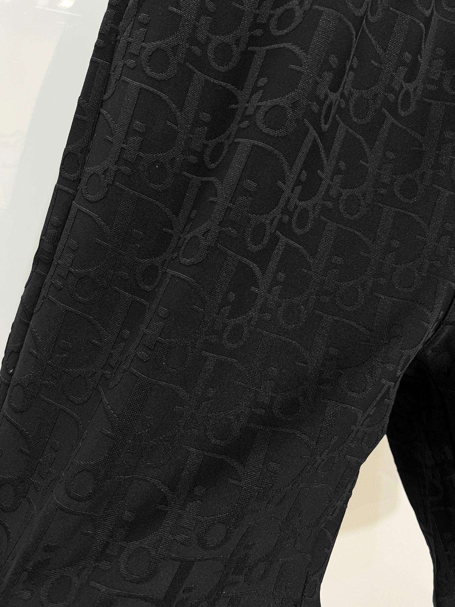 Black Dior monogram shorts side detail