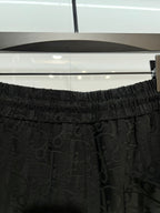 Black Dior monogram shorts with elastic waistband and tie-front