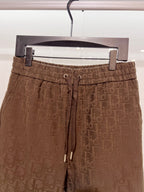 Dior logo-pattern drawstring shorts, brown elastic waistband and lace-up drawstring