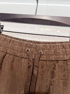 Dior logo-pattern drawstring shorts, brown waistband with drawstring eyelets