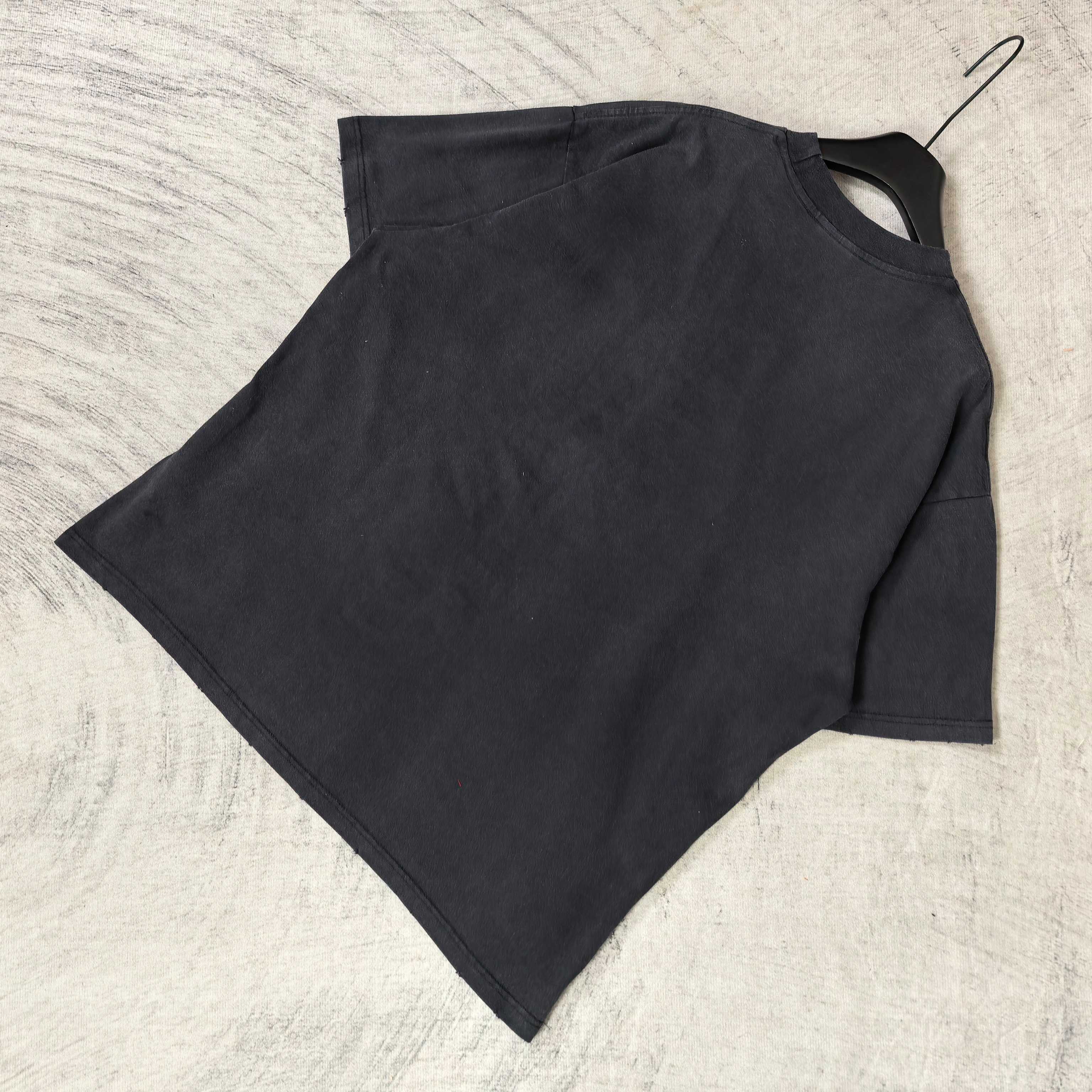 Balenciaga T-shirt, dark folded; plain short-sleeve crewneck back view