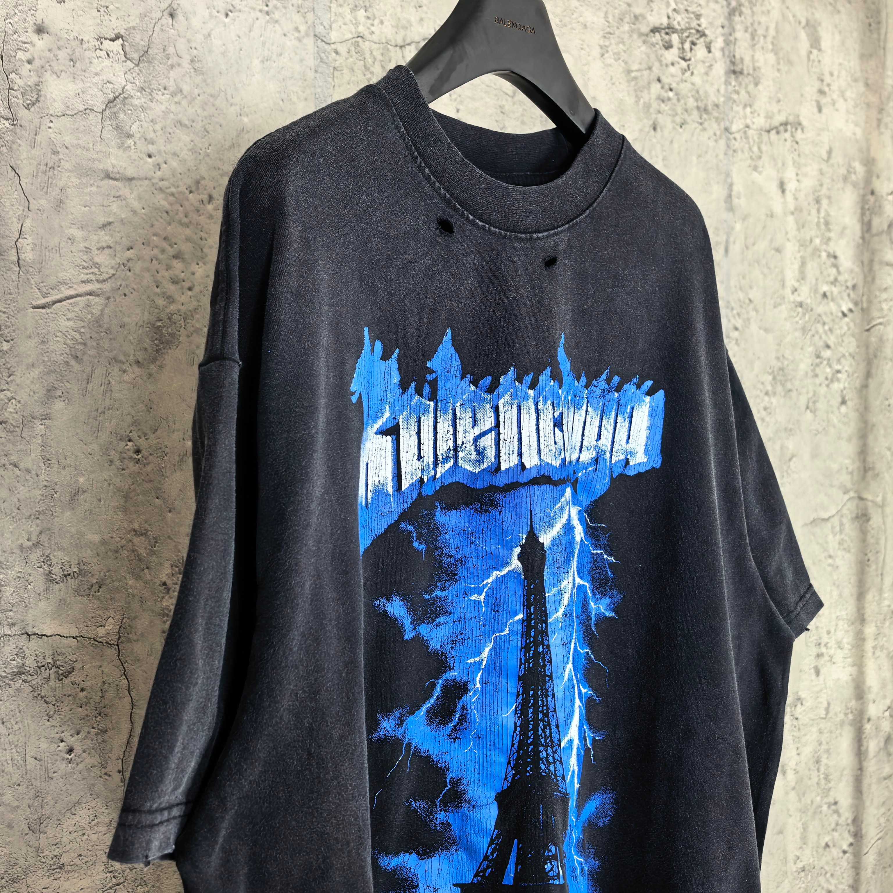 Balenciaga graphic T-shirt, dark crewneck with centered blue Eiffel lightning front print
