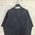 Balenciaga T-shirt, dark short-sleeve crewneck; plain back with neckline and seams visible