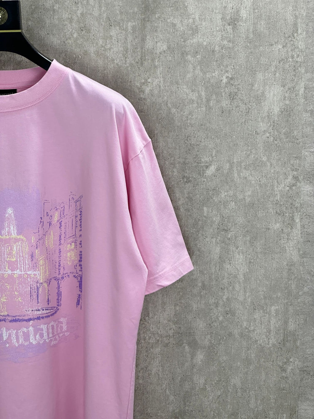 Balenciaga pink T-shirt sleeve and chest graphic detail