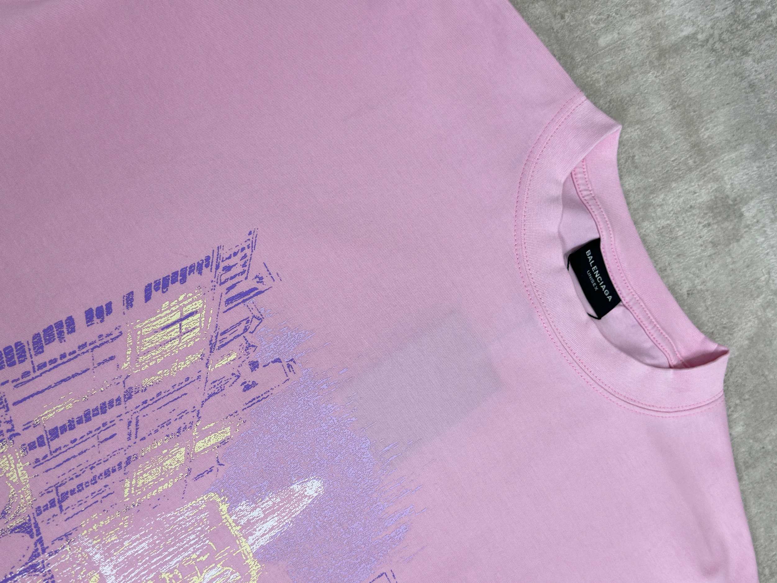 Balenciaga pink T-shirt neckline detail with small black brand tag