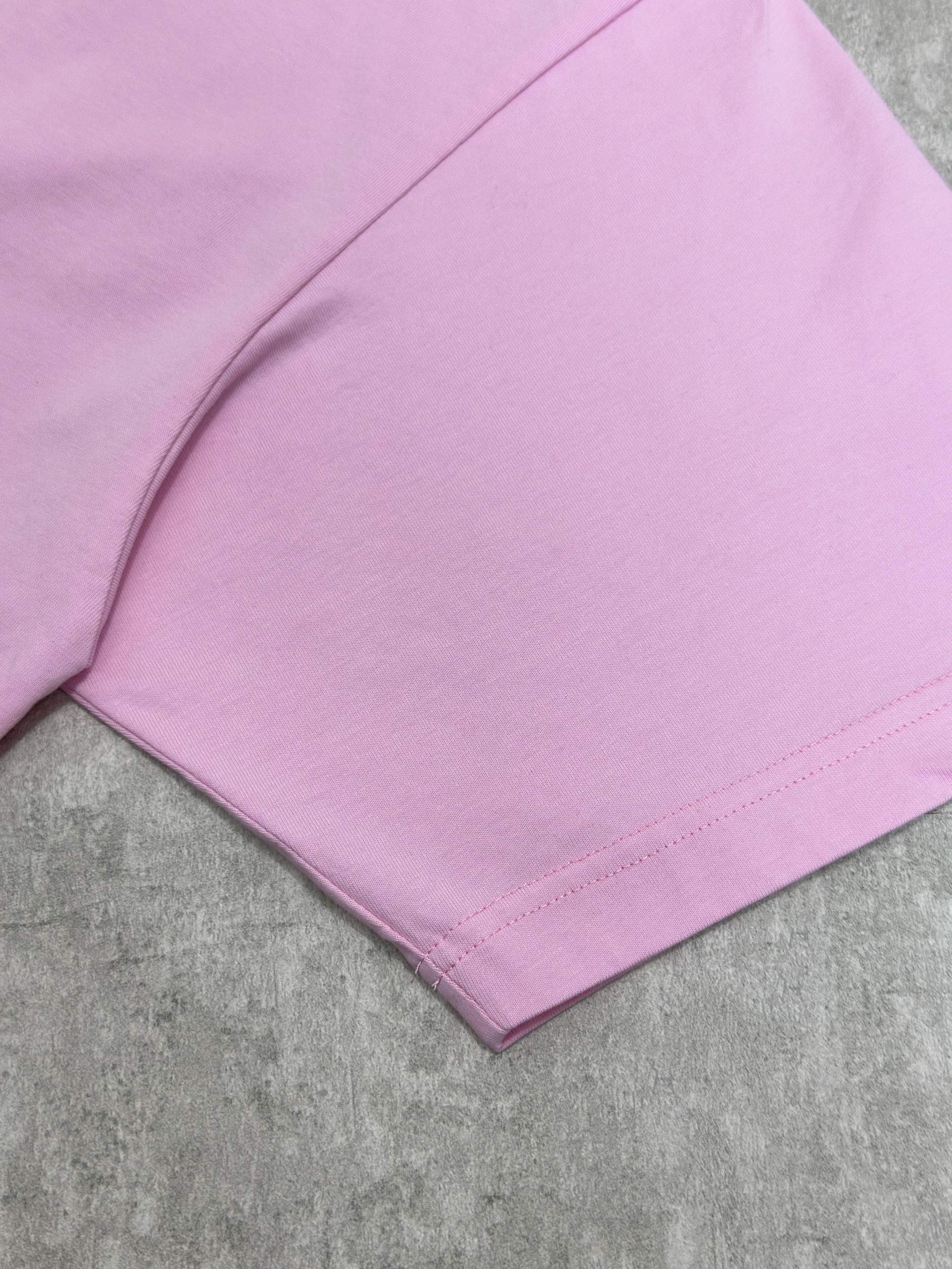 Balenciaga pink T-shirt sleeve seam and hem stitching close-up
