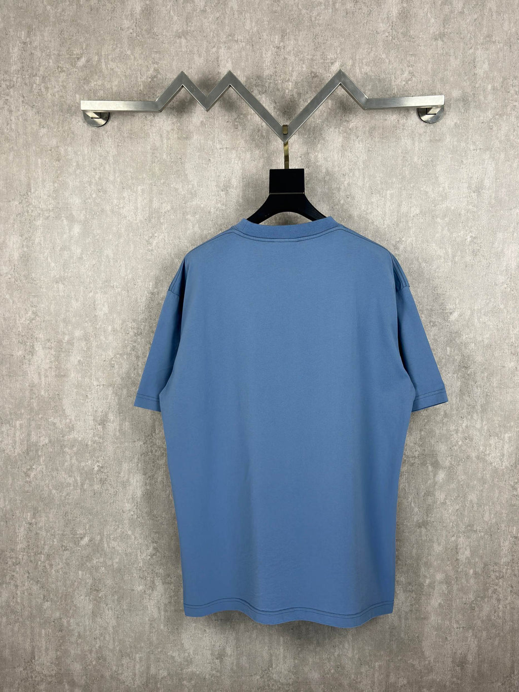 Balenciaga blue T-shirt on hanger, crew neck, short sleeves, plain back view
