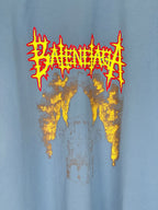 Balenciaga blue T-shirt front graphic close-up with red lettering and gold paint effect