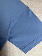 Balenciaga blue T-shirt sleeve and hem close-up, short sleeves, clean stitching