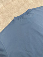 Balenciaga blue T-shirt back shoulder and collar close-up, short sleeves, crew neck seam