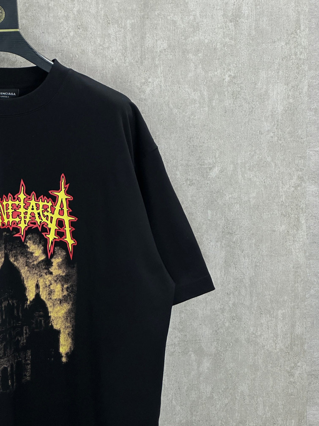 Balenciaga black short-sleeve shirt close-up of front graphic on the chest