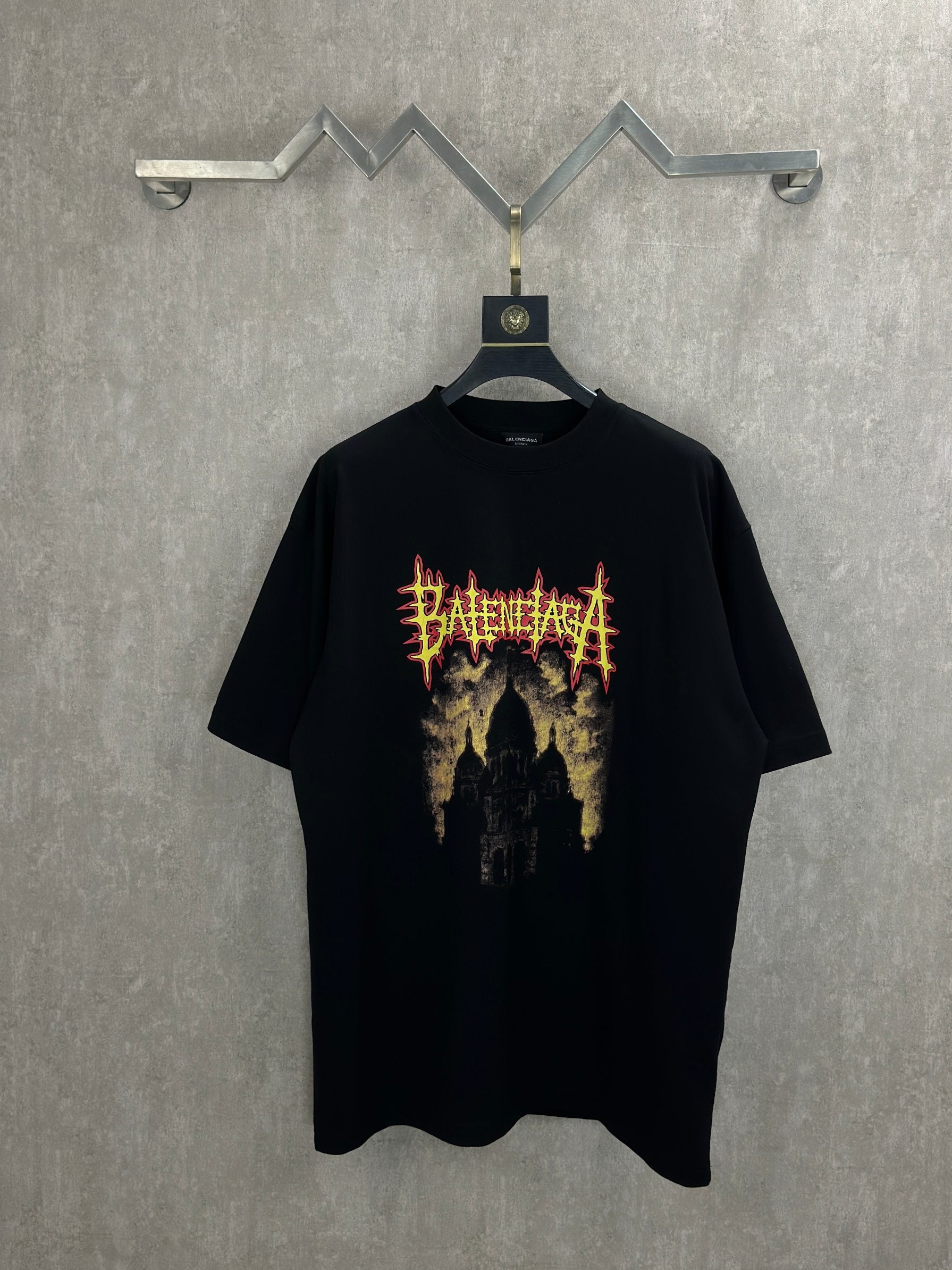 Balenciaga black short-sleeve shirt with large front graphic in red, yellow and gold