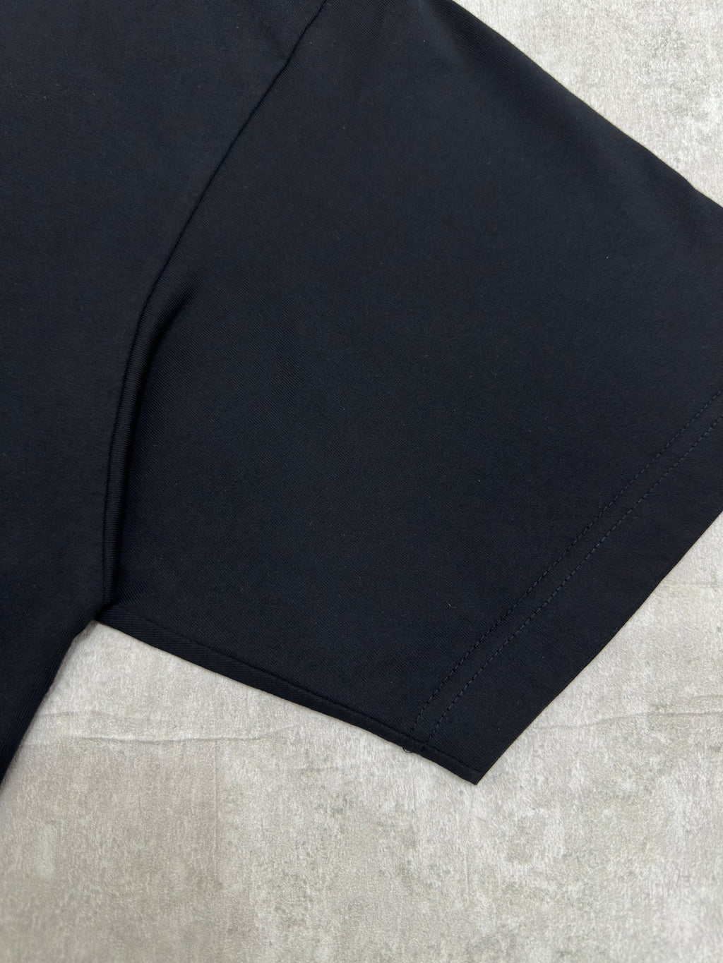 Balenciaga black T-shirt hem and side seam detail