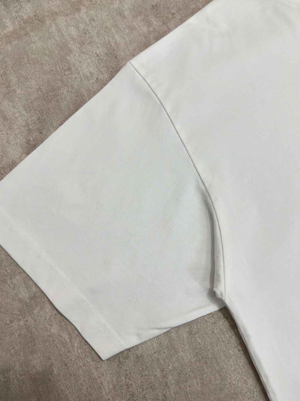 White T-shirt folded view, short sleeves and straight hem