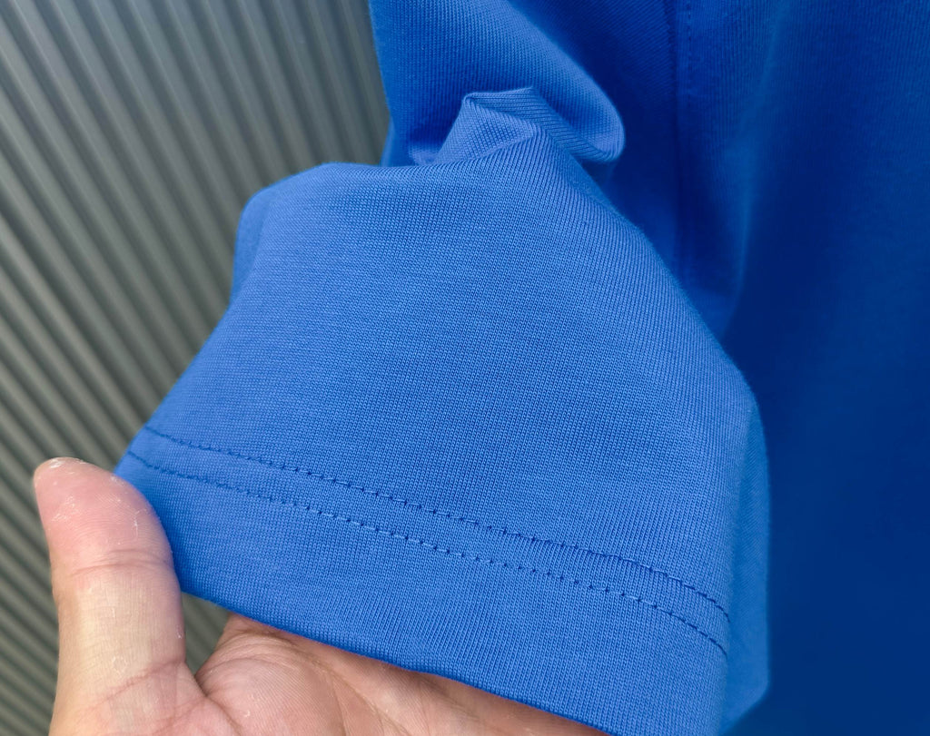 Blue Givenchy T-shirt hem with double stitching