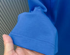 Blue Givenchy T-shirt hem with double stitching