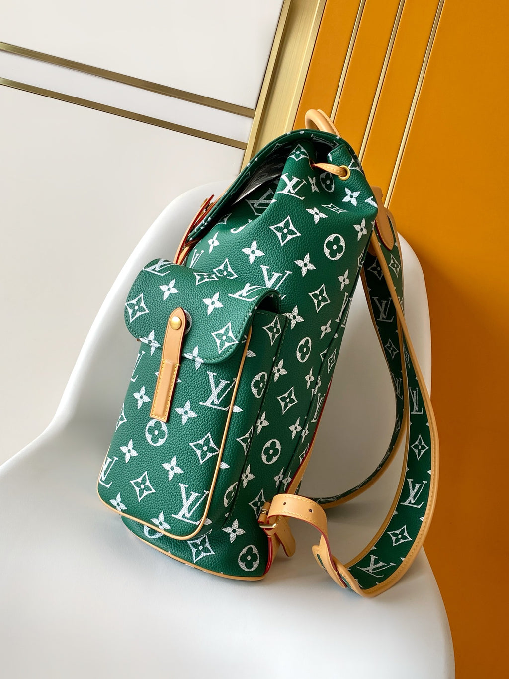 Louis Vuitton green monogram handbag with crossbody strap and tan leather trim