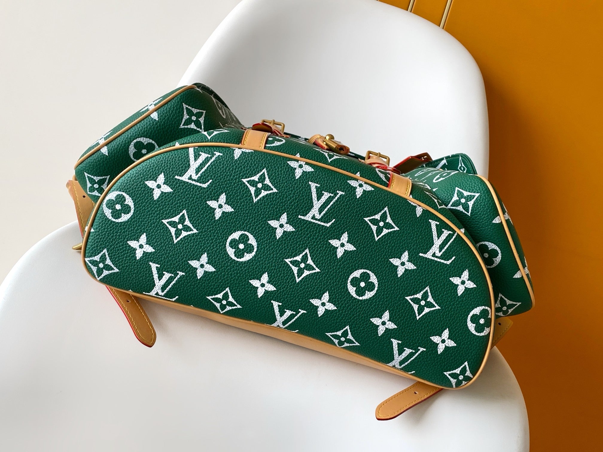 Louis Vuitton green monogram pouch bag with tan piping and zipper pull