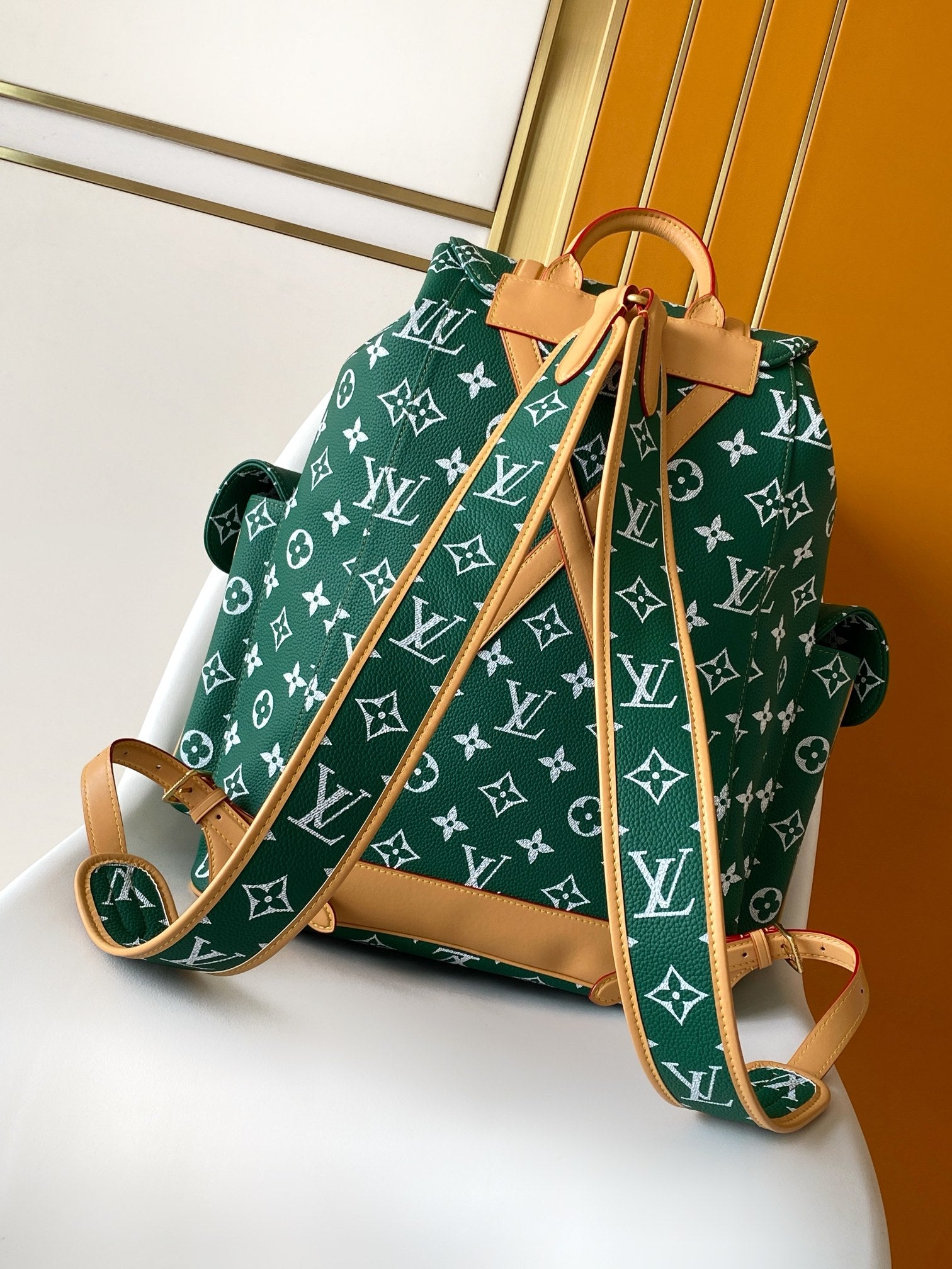 Louis Vuitton green monogram drawstring bag with tan straps and bottom