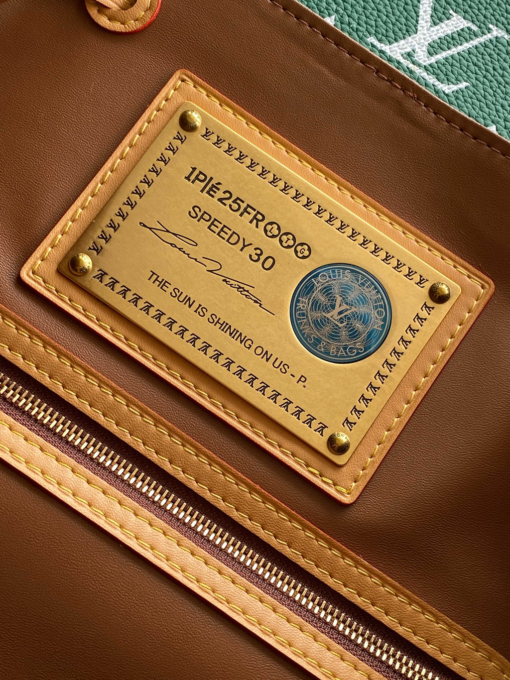 Louis Vuitton interior label with code text and Speedy 30 wording
