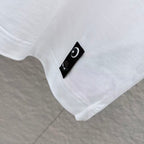 White T-shirt hem with black FENDI care label patch