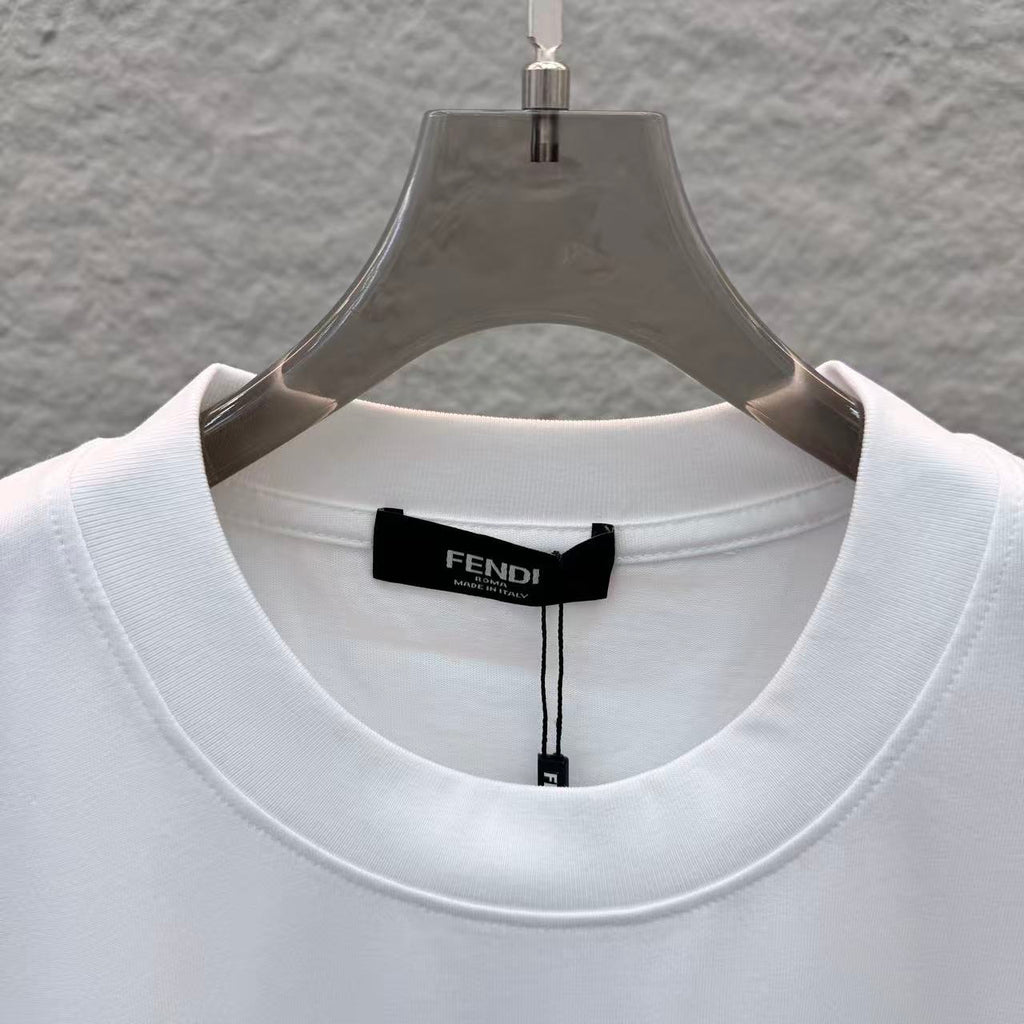 White Fendi T-shirt crew neck with black FENDI label at the collar