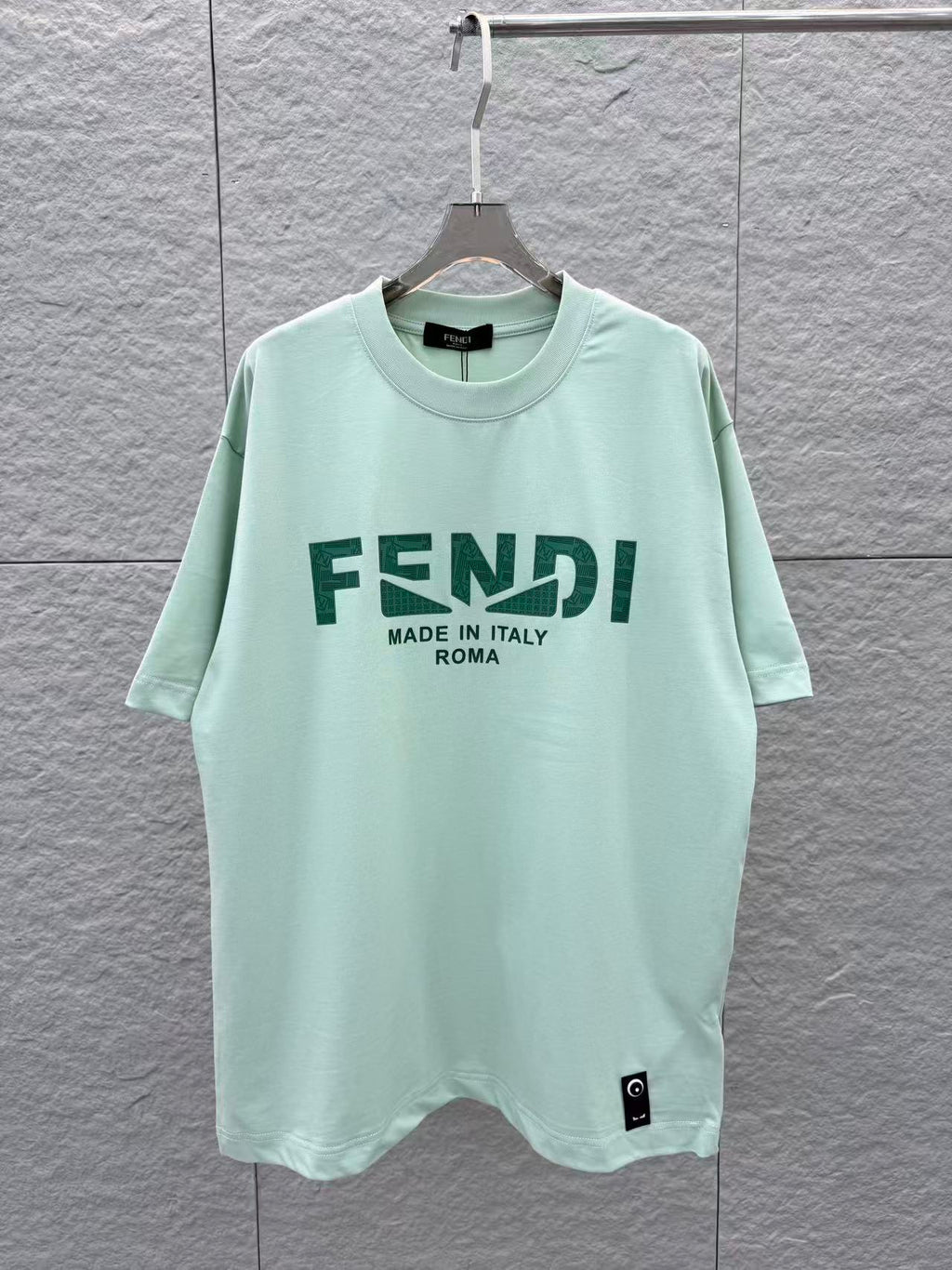 Mint green Fendi crewneck T-shirt with FENDI and “Made in Italy Roma” print