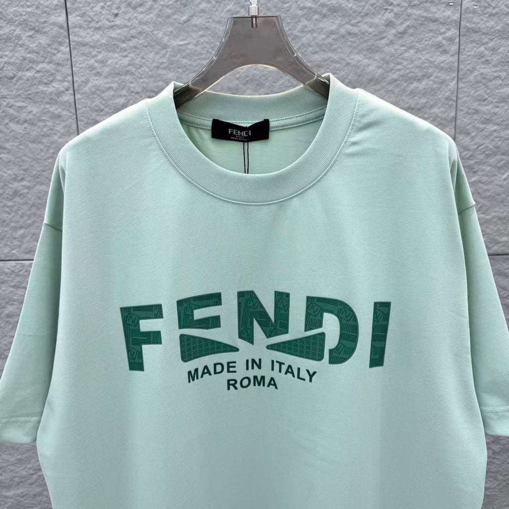 Mint green Fendi T-shirt close-up with FENDI logo and “Made in Italy Roma”