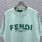 Mint green Fendi T-shirt close-up with FENDI logo and “Made in Italy Roma”