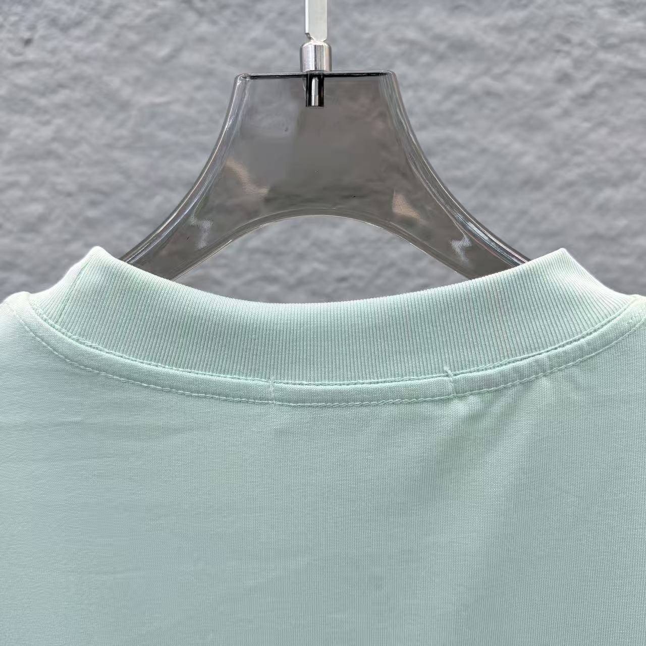 Mint green crewneck T-shirt collar with ribbed neckline detail