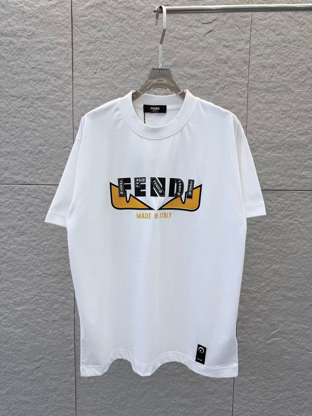 White Fendi short-sleeve T-shirt with front logo graphic and “Made in Italy”