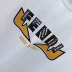 White Fendi short-sleeve T-shirt close-up of multicolor logo and “Made in Italy”