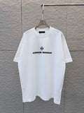 White short-sleeve T-shirt with small black chest graphic print