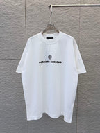 White short-sleeve T-shirt with small black chest graphic print