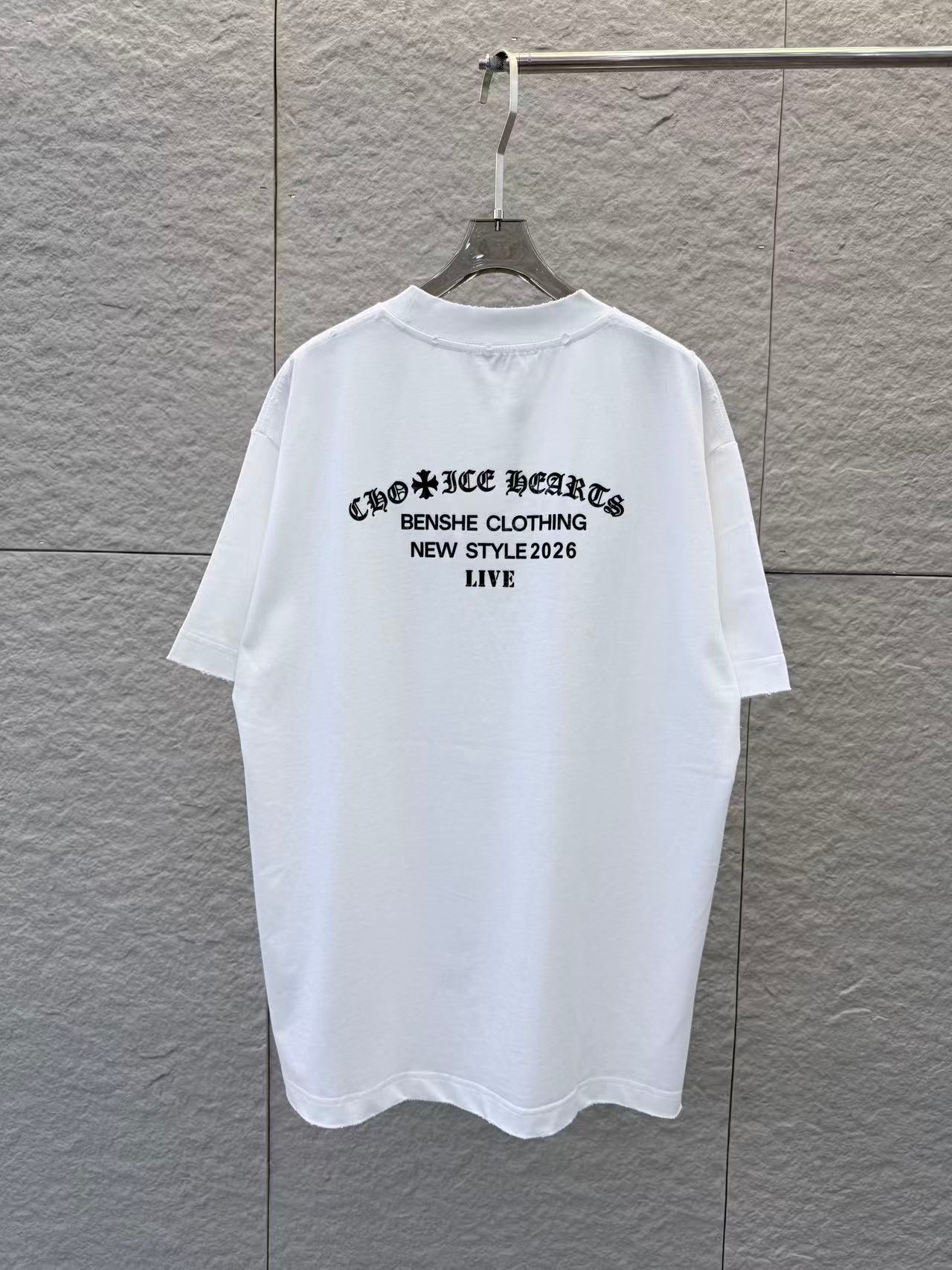 White short-sleeve T-shirt with centered black text print and small logo