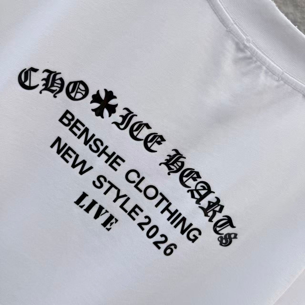 Close-up of black typographic print on white T-shirt: NEW STYLE 2026 LIVE