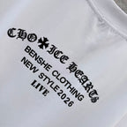 Close-up of black typographic print on white T-shirt: NEW STYLE 2026 LIVE