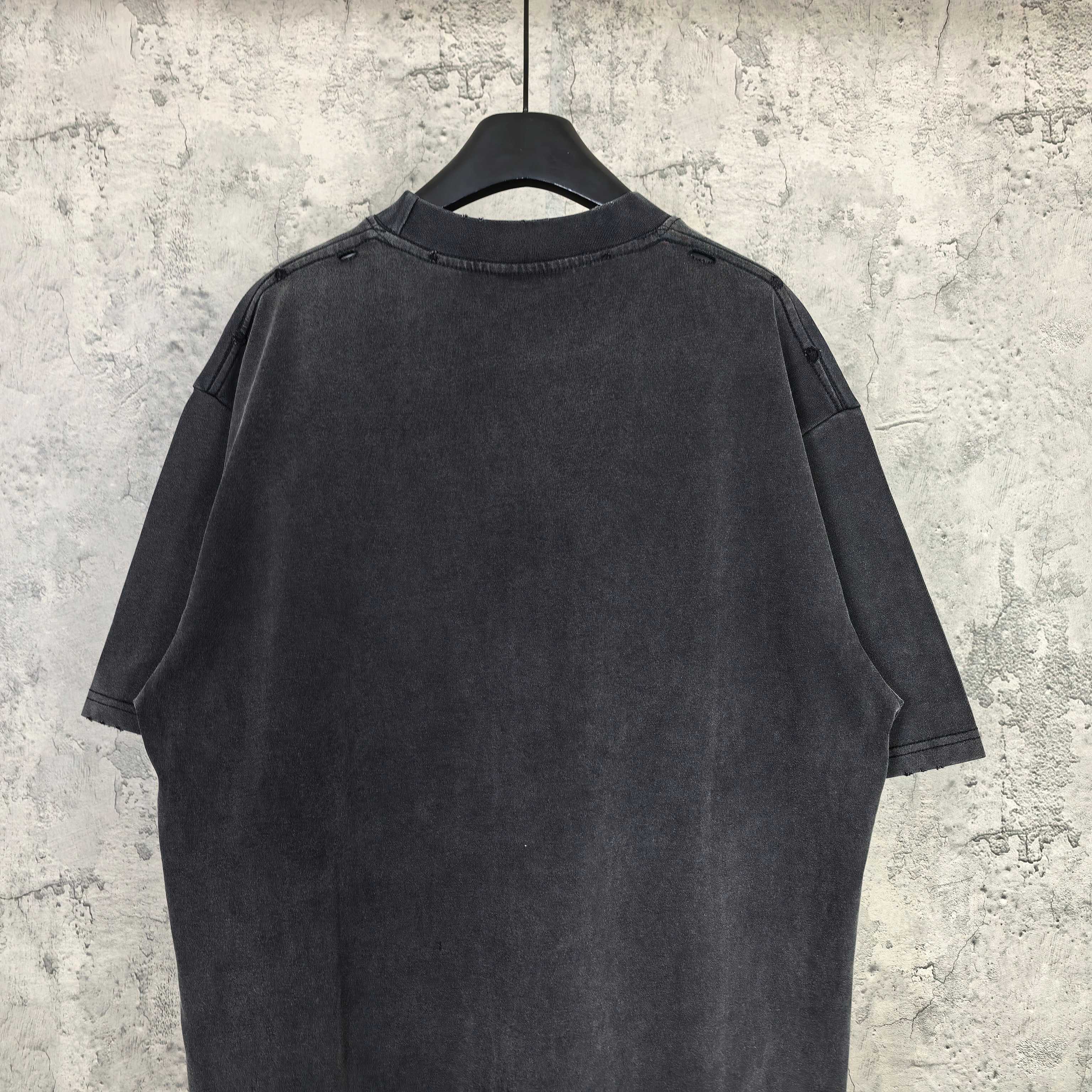 Black graphic T-shirt back view, plain with short sleeves