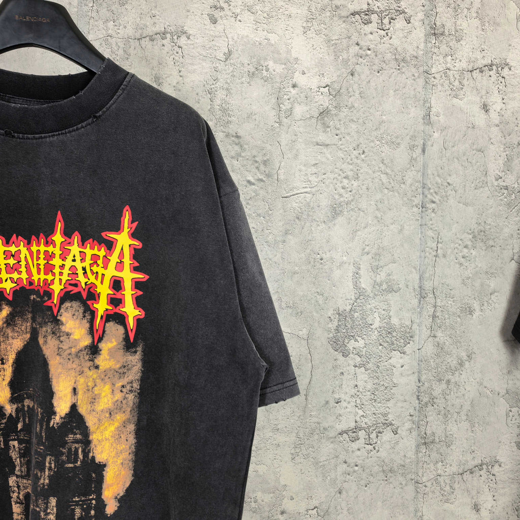 Black graphic T-shirt with red/yellow cathedral print detail at chest