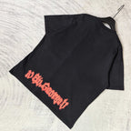Black graphic T-shirt with red diagonal lettering on front, short sleeves