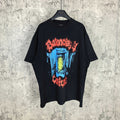 Black graphic T-shirt with multicolor face print on front, short sleeves, crew neck