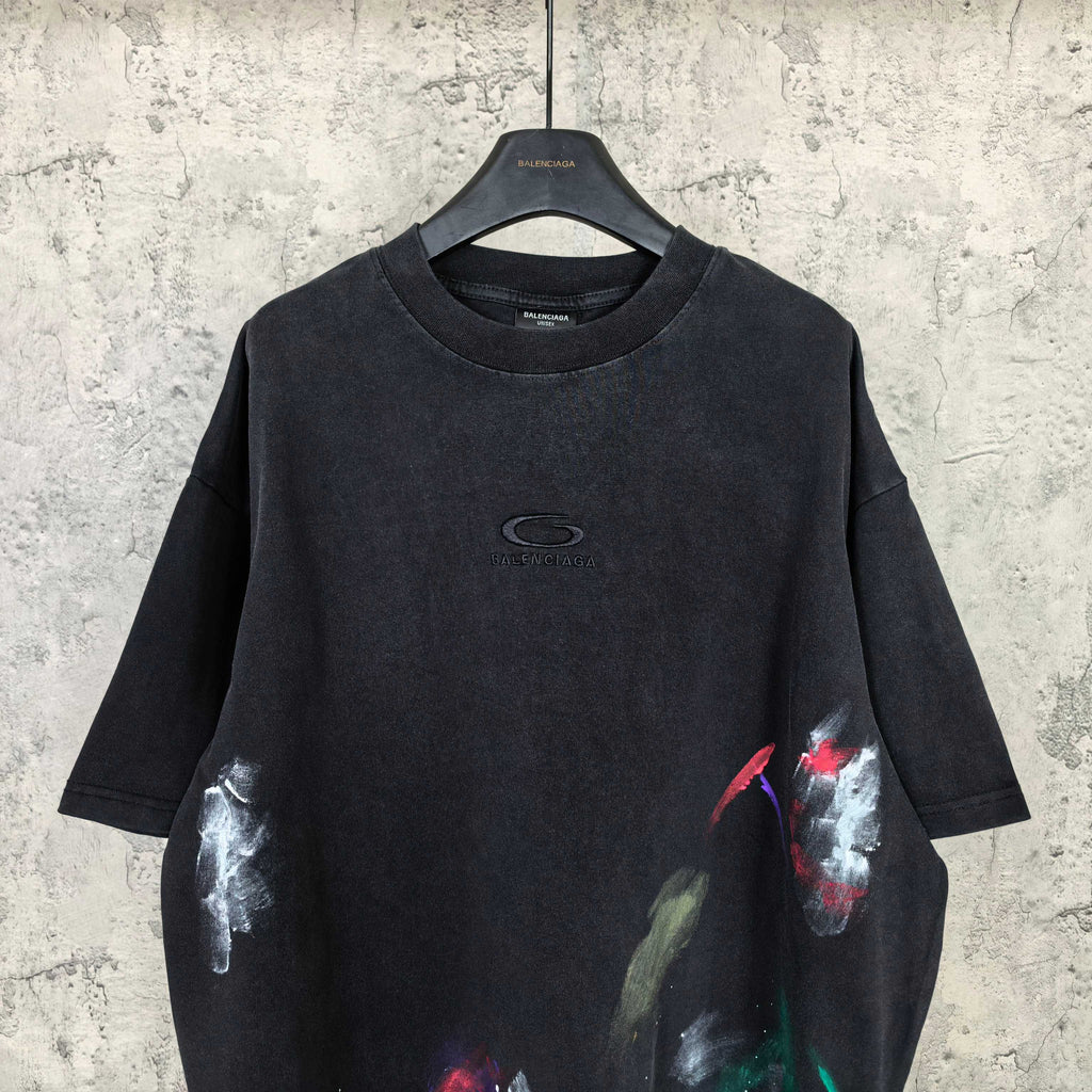 Balenciaga short-sleeve T-shirt, black with small chest logo and colorful paint graphic